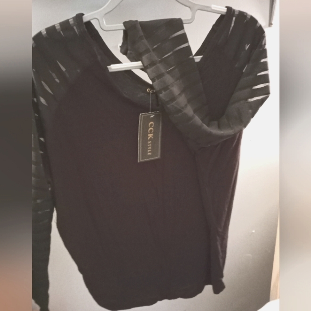 A sheer long sleeve